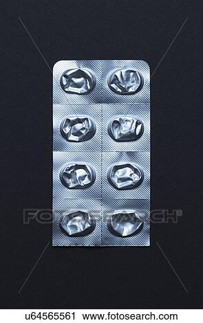 Still life of used section of silver blister pack View Large Photo Image Stock Image - Still life of used section of silver blister pack. Fotosearch