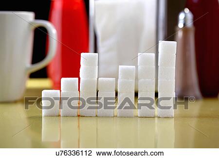 Sugar lumps stacked in shape of graph View Large Photo Image Stock Image - Sugar lumps stacked in shape of graph. Fotosearch