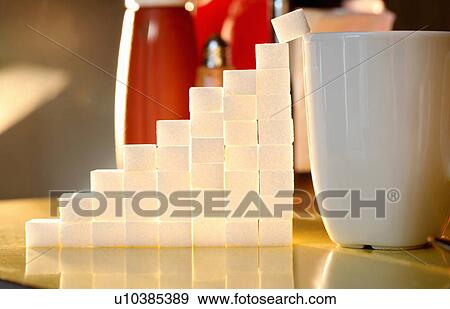 Sugar lumps stacked in shape of graph View Large Photo Image Stock Photo - Sugar lumps stacked in shape of graph. Fotosearch