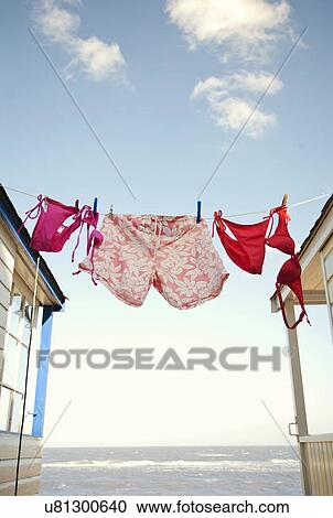 Swimwear on washing line, Southwold, Suffolk, UK View Large Photo Image Stock Image - Swimwear on washing line, Southwold, Suffolk, UK. Fotosearch