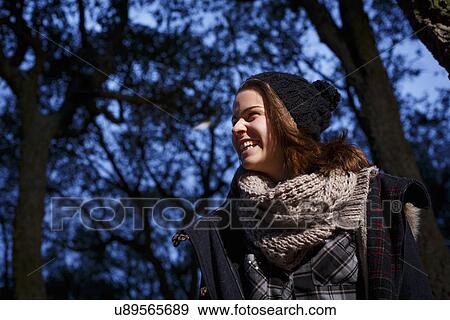 Teenage girl in forest at dusk View Large Photo Image Stock Photo - Teenage girl in forest at dusk. Fotosearch