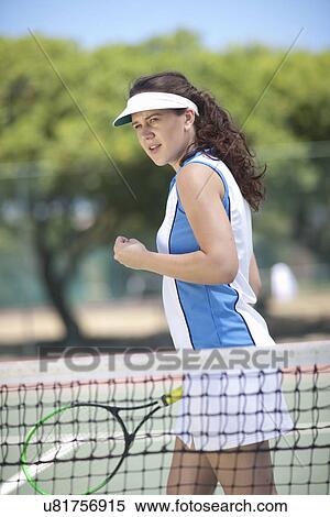 Stock Photography - Tennis player celebrating. Fotosearch