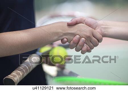 Tennis players shaking hands View Large Photo Image Stock Image - Tennis players shaking hands. Fotosearch