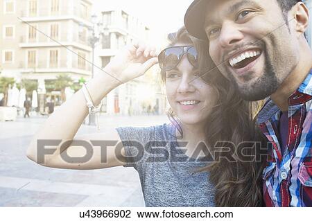 Tourist couple sightseeing, Plaza de la Virgen, Valencia, Spain View Large Photo Image Stock Image - Tourist couple sightseeing, Plaza de la Virgen, Valencia, Spain. Fotosearch