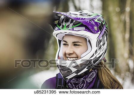Two female mountain bikers taking a break View Large Photo Image Stock Photography - Two female mountain bikers taking a break. Fotosearch