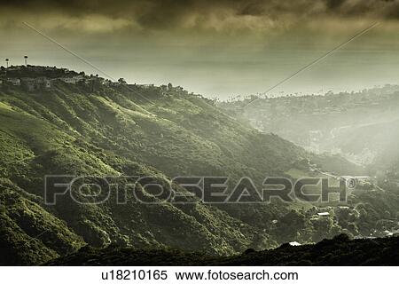 Stock Photography - View of hills and dramatic sky, Laguna Beach, California, USA. Fotosearch