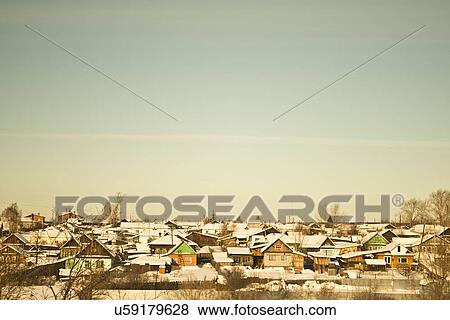 Village with snow on rooftops, Russia View Large Photo Image Stock Photo - Village with snow on rooftops, Russia. Fotosearch
