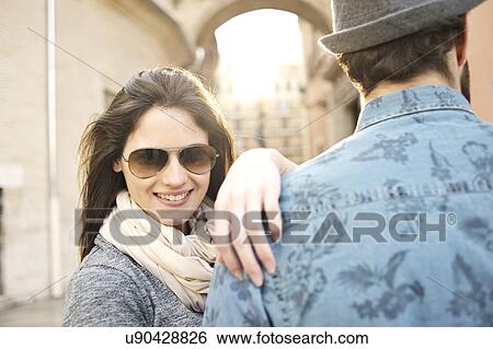 Stock Photograph - Young couple enjoying vacation, Valencia, Spain. Fotosearch