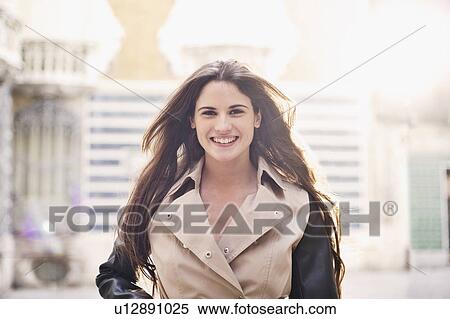 Young female tourist strolling outside Museum of Ceramics, Valencia, Spain View Large Photo Image Stock Photography - Young female tourist strolling outside Museum of Ceramics, Valencia, Spain. Fotosearch