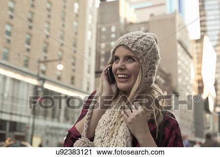 Young female tourist using cellphone, New York City, USA View Large Photo Image Stock Image - Young female tourist using cellphone, New York City, USA. Fotosearch