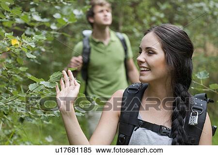 Young hikers in forest View Large Photo Image Stock Photography - Young hikers in forest. Fotosearch