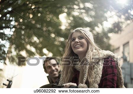 Stock Image - Young tourist couple with bicycle, New York City, USA. Fotosearch