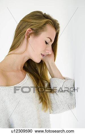 Stock Image - Young woman on phonecall. Fotosearch