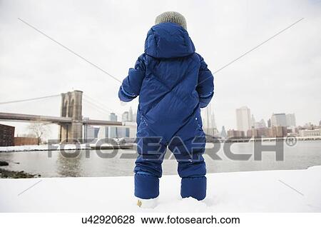Boy (4-5) looking at Brooklyn Bridge View Large Photo Image Stock Photo - Boy (4-5) looking at Brooklyn Bridge. Fotosearch