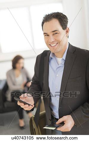 Businessman at airport View Large Photo Image Stock Photography - Businessman at airport. Fotosearch