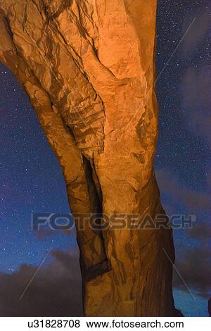 Stock Photo - Close-up of natural arch at night. Fotosearch
