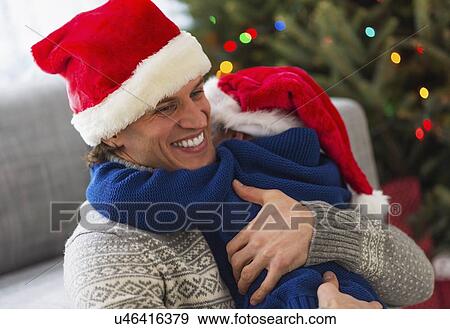 Father and son (6-7) embracing each other View Large Photo Image Stock Photo - Father and son (6-7) embracing each other. Fotosearch