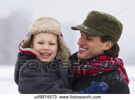 Father and son (6-7) smiling View Large Photo Image Stock Image - Father and son (6-7) smiling. Fotosearch