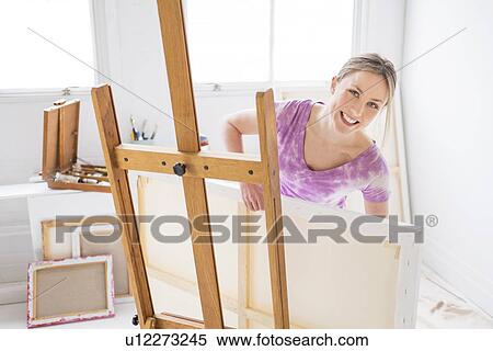 Female painter in studio View Large Photo Image Stock Photography - Female painter in studio. Fotosearch