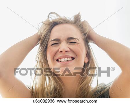Frustrated woman pulling hair View Large Photo Image Stock Photograph - Frustrated woman pulling hair. Fotosearch
