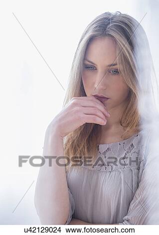 Portrait of sad young woman View Large Photo Image Picture - Portrait of sad young woman. Fotosearch
