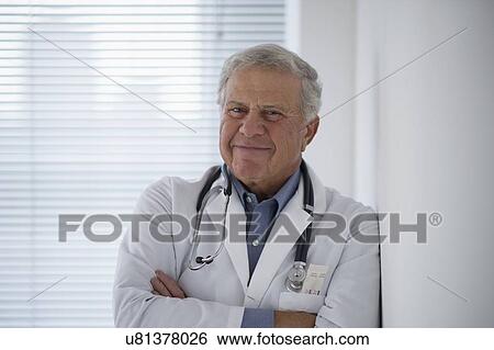 Stock Photograph - Portrait of senior doctor. Fotosearch