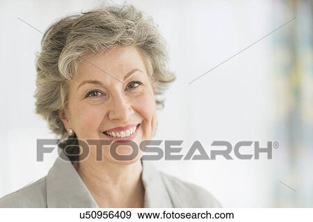 Portrait of smiling woman View Large Photo Image Stock Photo - Portrait of smiling woman. Fotosearch