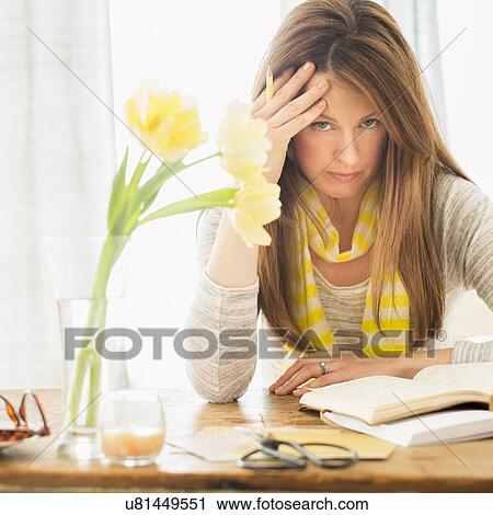 Portrait of woman at desk View Large Photo Image Stock Image - Portrait of woman at desk. Fotosearch