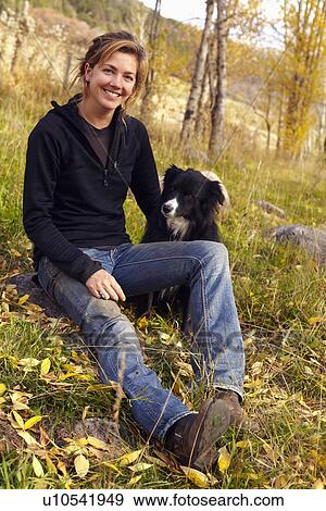 Portrait of woman with her collie outdoors View Large Photo Image Stock Photo - Portrait of woman with her collie outdoors. Fotosearch