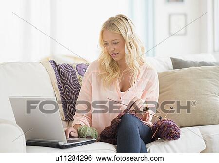 Portrait of young woman learning knitting View Large Photo Image Stock Photograph - Portrait of young woman learning knitting. Fotosearch