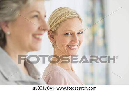 Stock Image - Profiles of two mature women. Fotosearch