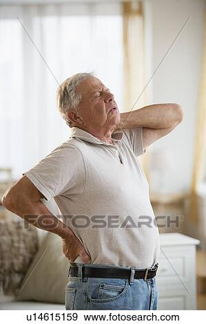 Senior man stretching View Large Photo Image Stock Photo - Senior man stretching. Fotosearch