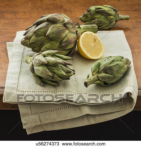 Studio shot of artichokes View Large Photo Image Stock Image - Studio shot of artichokes. Fotosearch