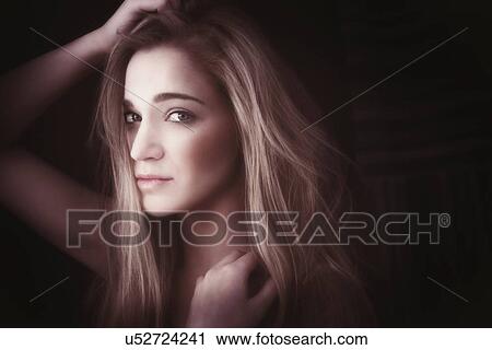 Studio shot of beautiful blonde woman View Large Photo Image Stock Image - Studio shot of beautiful blonde woman. Fotosearch