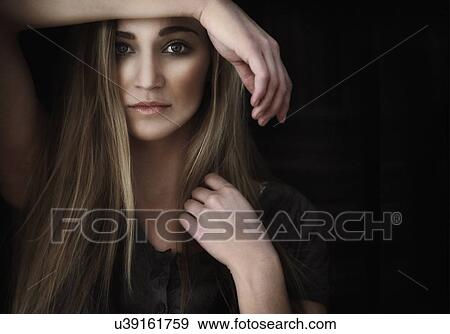 Studio shot of beautiful blonde woman View Large Photo Image Stock Photo - Studio shot of beautiful blonde woman. Fotosearch
