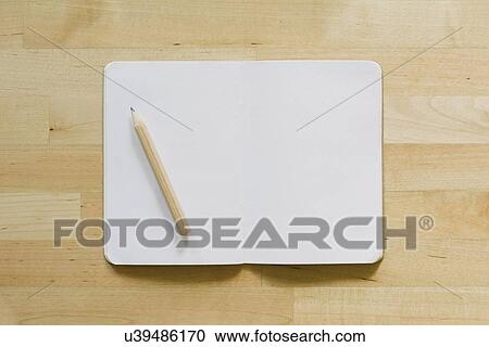 Studio shot of empty diary with pencil View Large Photo Image Stock Image - Studio shot of empty diary with pencil. Fotosearch