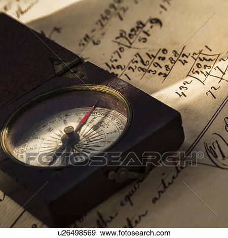 Stock Photo - Studio shot of old fashioned compass. Fotosearch