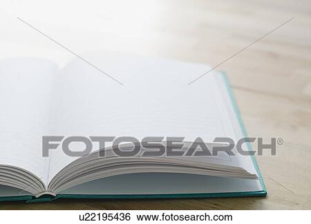 Studio shot of open book View Large Photo Image Stock Photograph - Studio shot of open book. Fotosearch
