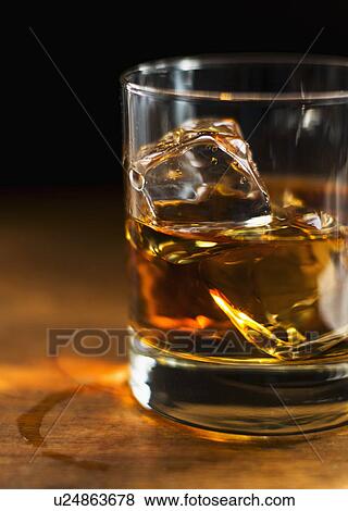 Studio shot of whisky View Large Photo Image Stock Photo - Studio shot of whisky. Fotosearch