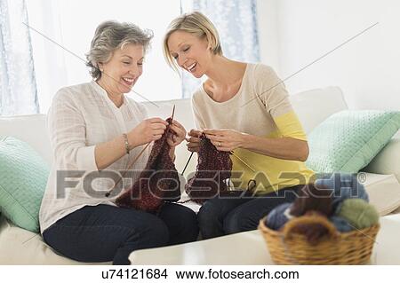 Two mature women knitting View Large Photo Image Picture - Two mature women knitting. Fotosearch