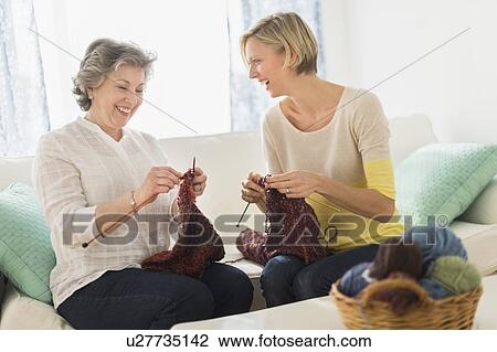 Two mature women knitting View Large Photo Image Stock Image - Two mature women knitting. Fotosearch