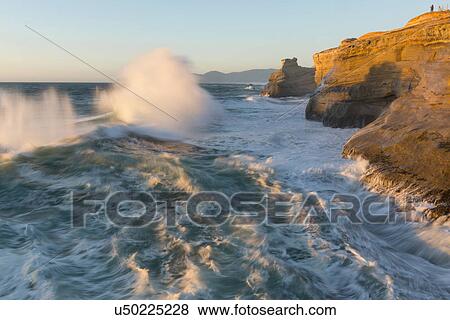 Waves crushing over cliffs View Large Photo Image Stock Photo - Waves crushing over cliffs. Fotosearch