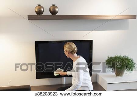 Woman cleaning house View Large Photo Image Stock Image - Woman cleaning house. Fotosearch