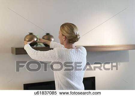 Woman cleaning house View Large Photo Image Stock Photography - Woman cleaning house. Fotosearch