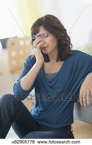 Stock Photo - Woman having headache. Fotosearch