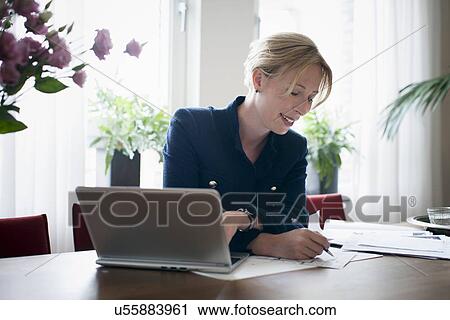 Woman in office View Large Photo Image Stock Image - Woman in office. Fotosearch