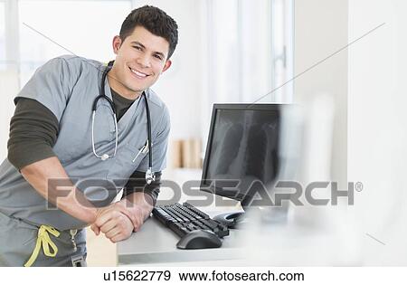 Young man with stethoscope View Large Photo Image Stock Photo - Young man with stethoscope. Fotosearch