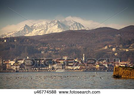 Arona and Mount Rosa beyond Lake Maggiore, Italy View Large Photo Image Stock Photo - Arona and Mount Rosa beyond Lake Maggiore, Italy. Fotosearch