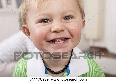 Baby boy smiling widely View Large Photo Image Stock Photo - Baby boy smiling widely. Fotosearch
