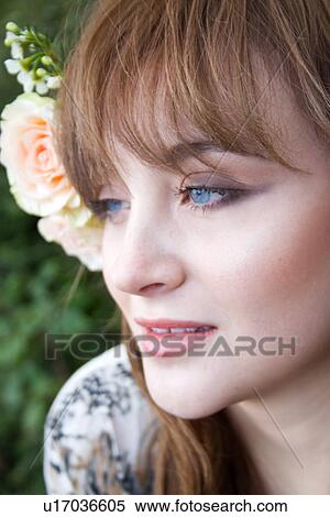 Close up portrait of young woman daydreaming View Large Photo Image Stock Photography - Close up portrait of young woman daydreaming. Fotosearch